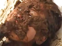 Sloppy scat fetish video featuring a fresh-faced college-aged Asian trollop covered in wet shit