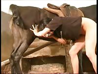 Woman pulls down pants to have horse sex