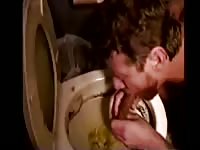 Vintage Video of a Fag Eating Shit From a Filthy Toilet 