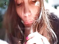 Busty brunette hoe providing fellatio on crowded